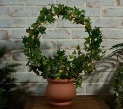 Alternative view of Compass Home Illuminated Grapevine Wreath in Planter